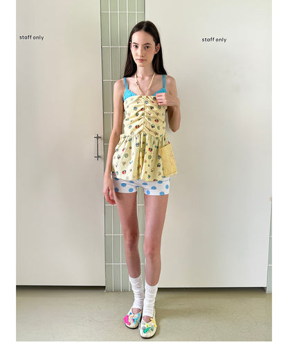 Unsocial Night strapless tube top showcasing a whimsical naive-art illustration print, central front detailing, and adjustable ribbon halter ties