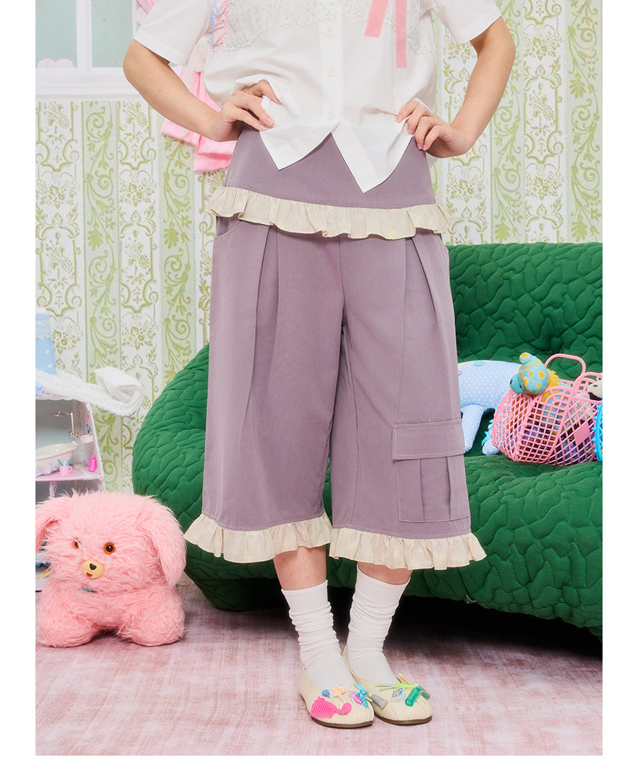 Front view of Unsocial Night purple star lace patchwork capri pants featuring a relaxed loose-fit silhouette, natural waist, and zipper fly closure in a cotton-linen fabric.