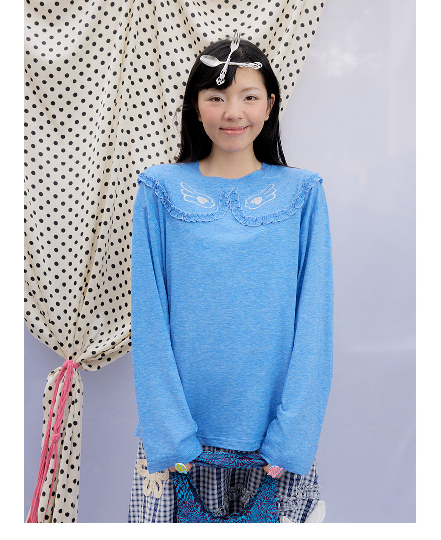 Front view of Unsocial Night blue ruffles tee top featuring a relaxed oversized silhouette, a classic crewneck, long sleeves, and paneled patchwork detailing