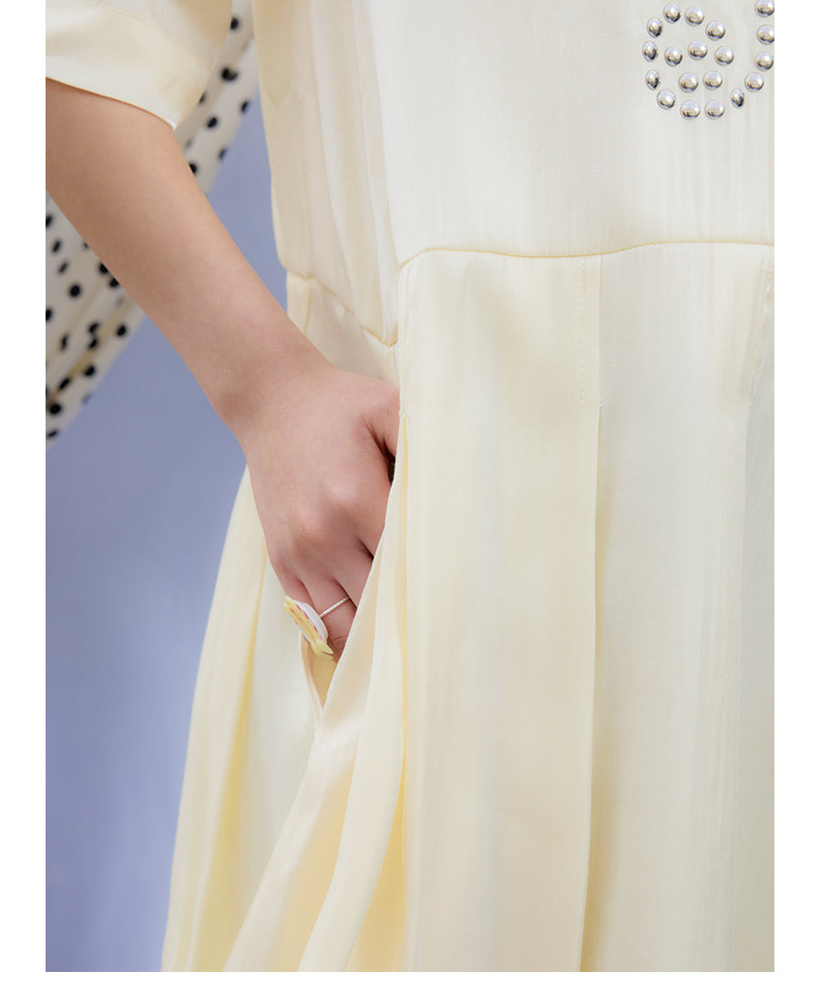 Front view of Unsocial Night beige Shimmer Waves pleated dress featuring an A-line silhouette, classic round neck, half sleeves, and delicate rhinestone embellishments