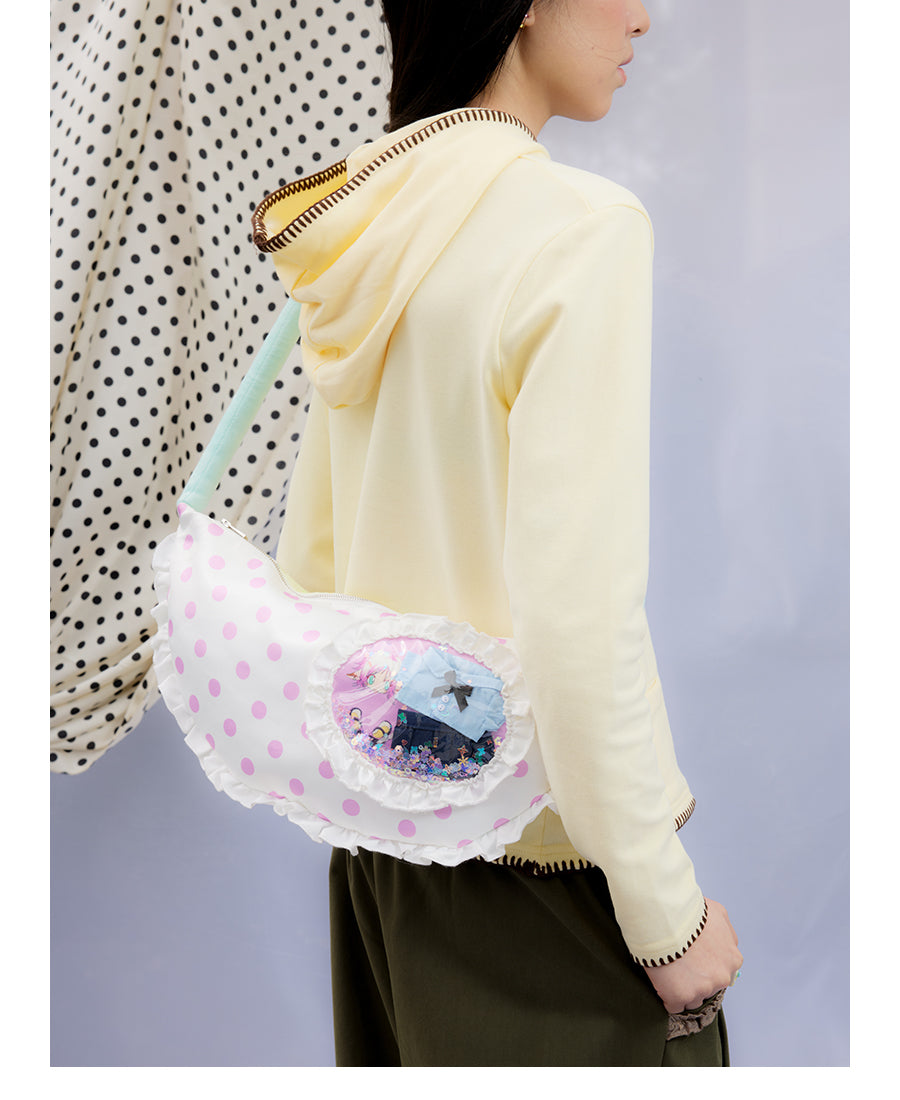 Front view of Unsocial Night Oliwa USN Girls Club pillow bag showcasing the custom artist painting print on a soft quilted padded shoulder bag silhouette
