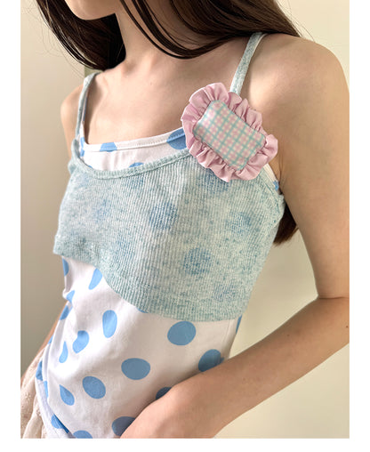 Unsocial Night knitted 2-piece set showcasing a whimsical polka dot print, contrast knit patchwork tailoring, camisole straps, and elasticated shorts