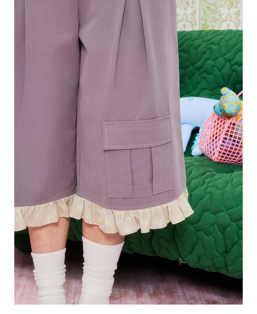 Front view of Unsocial Night purple star lace patchwork capri pants featuring a relaxed loose-fit silhouette, natural waist, and zipper fly closure in a cotton-linen fabric.