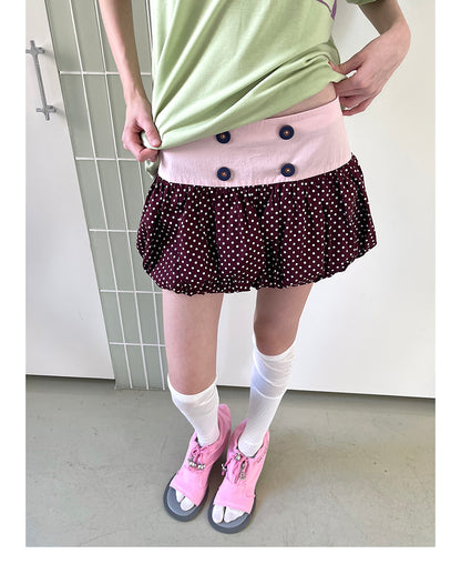 Unsocial Night bubble puff skort showcasing a whimsical polka dot print, contrast patchwork detailing, structured voluminous hem, and internal shorts