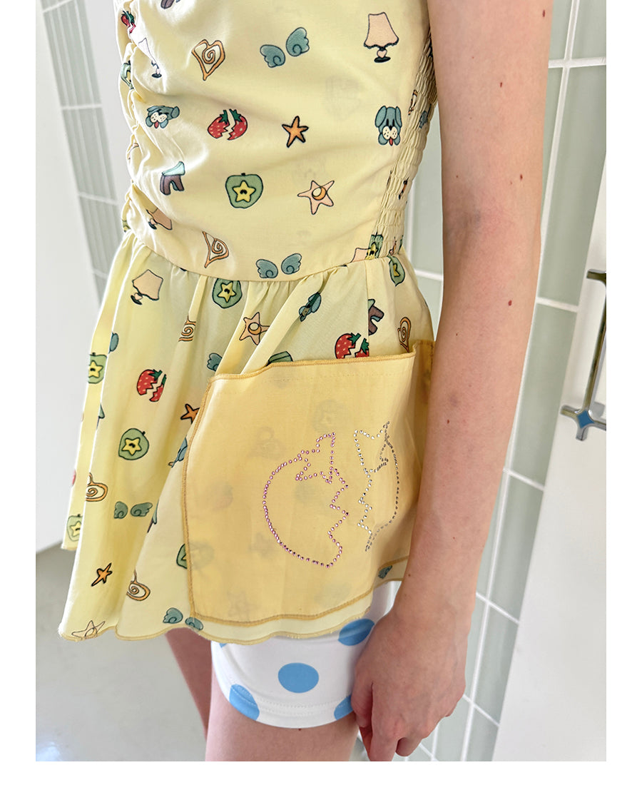 Unsocial Night strapless tube top showcasing a whimsical naive-art illustration print, central front detailing, and adjustable ribbon halter ties