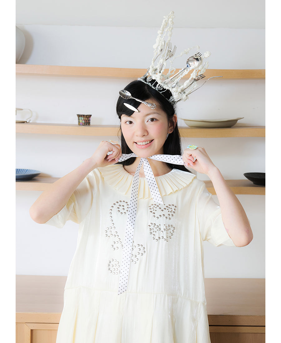 Front view of Unsocial Night beige Shimmer Waves pleated dress featuring an A-line silhouette, classic round neck, half sleeves, and delicate rhinestone embellishments