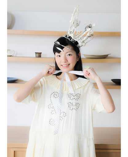 Front view of Unsocial Night beige Shimmer Waves pleated dress featuring an A-line silhouette, classic round neck, half sleeves, and delicate rhinestone embellishments