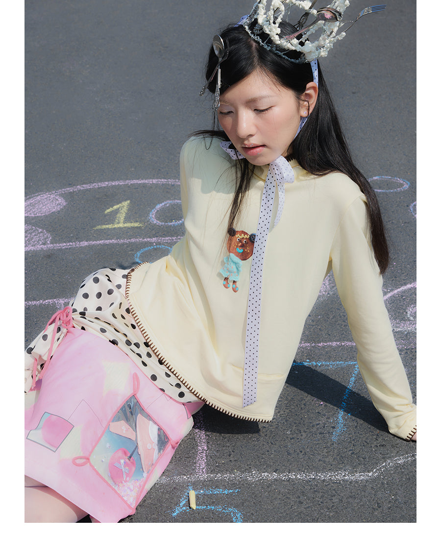 Front view of Unsocial Night My Candy Window cute skirt featuring a mid-rise straight silhouette, printed fabric with sequin embellishments, and a fully lined interior