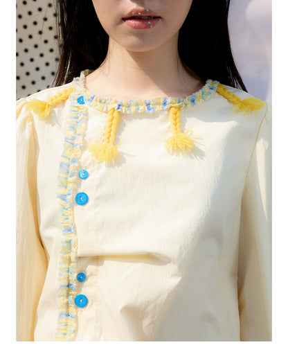 Front view of Unsocial Night pale yellow Wrapped in Lemon Souffle shirt featuring a soft regular fit, short sleeves, split neck with ponytail ties, and panel stitching