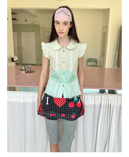 Unsocial Night short sleeve shirt showcasing the sheer mesh panel inserts, central button closures, slim-fit tailoring, and structural flutter sleeves