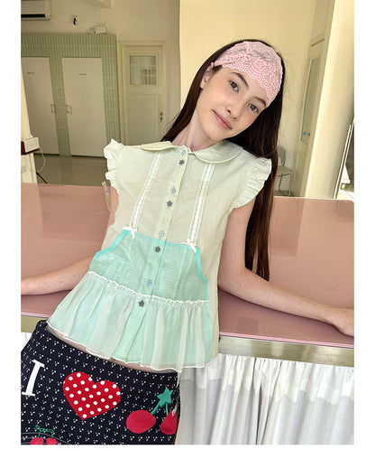 Unsocial Night short sleeve shirt showcasing the sheer mesh panel inserts, central button closures, slim-fit tailoring, and structural flutter sleeves