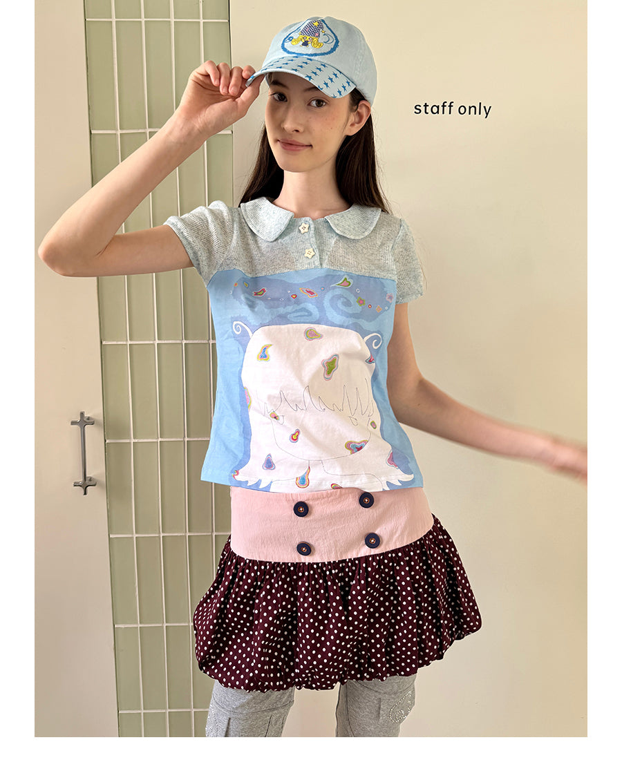 Unsocial Night bubble puff skort showcasing a whimsical polka dot print, contrast patchwork detailing, structured voluminous hem, and internal shorts
