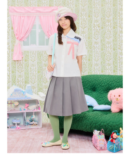 Front view of Unsocial Night white bikini-inspired lace trim shirt featuring a straight silhouette, regular short sleeves, a Peter Pan collar, and button closure