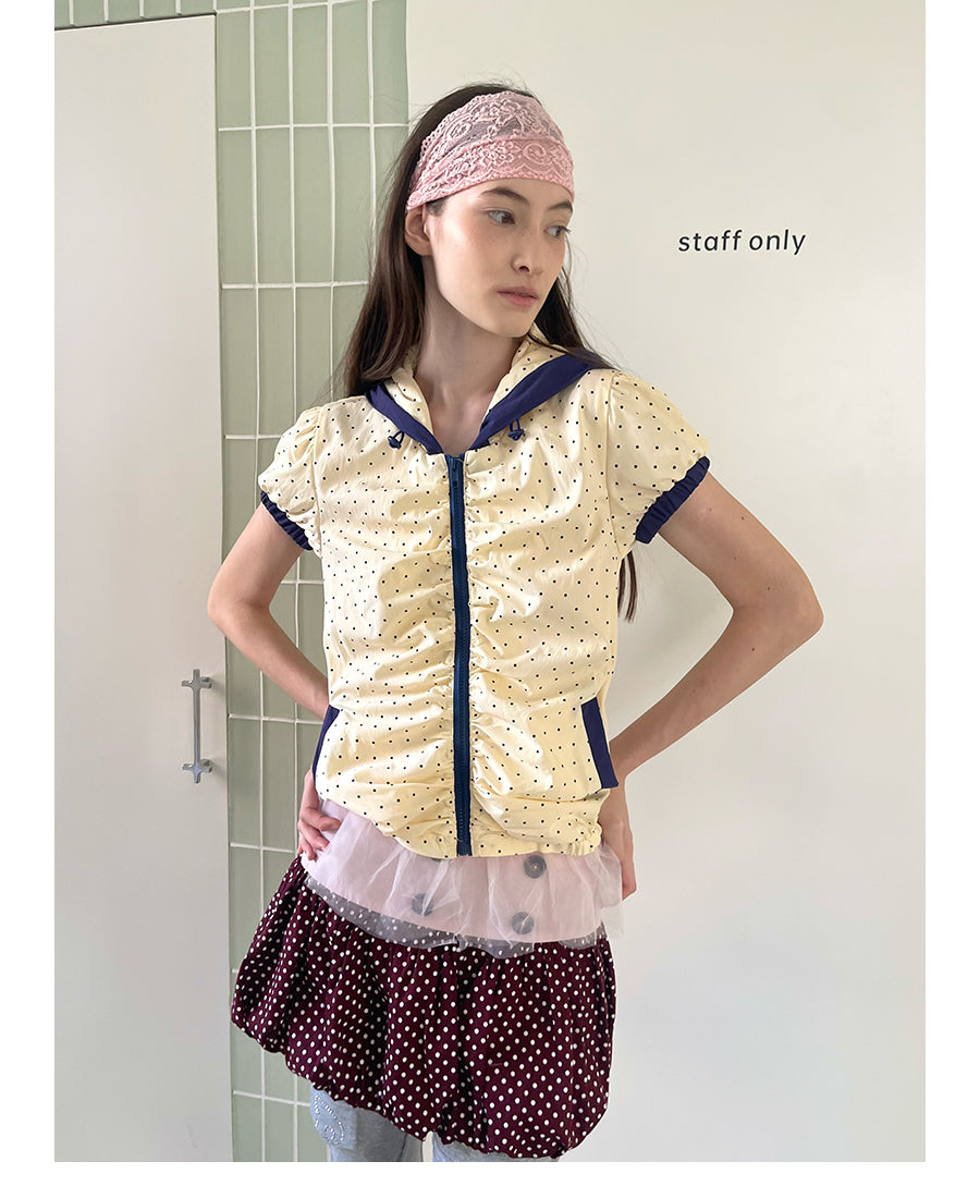 Unsocial Night bubble puff skort showcasing a whimsical polka dot print, contrast patchwork detailing, structured voluminous hem, and internal shorts
