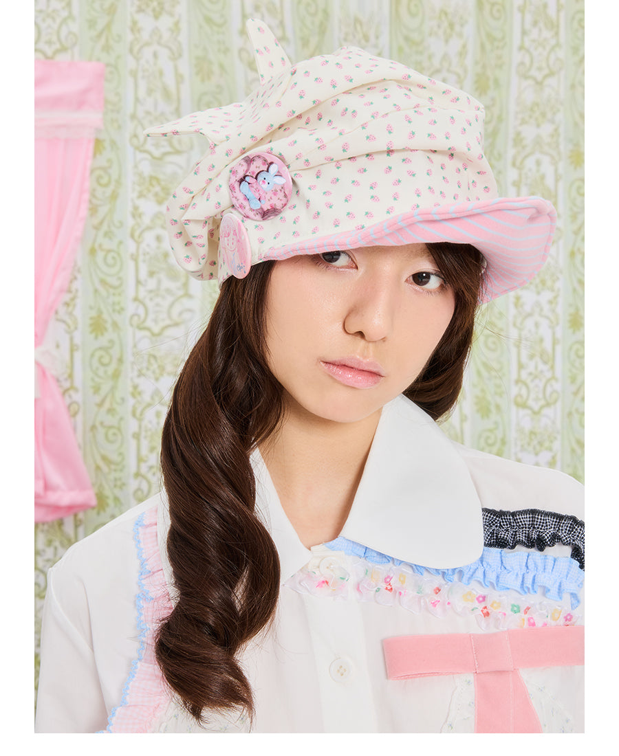 Front view of Unsocial Night strawberry striped cat ear beanie featuring a pleated slouched slouchy shape, a soft brim, and non-adjustable cotton knit texture.