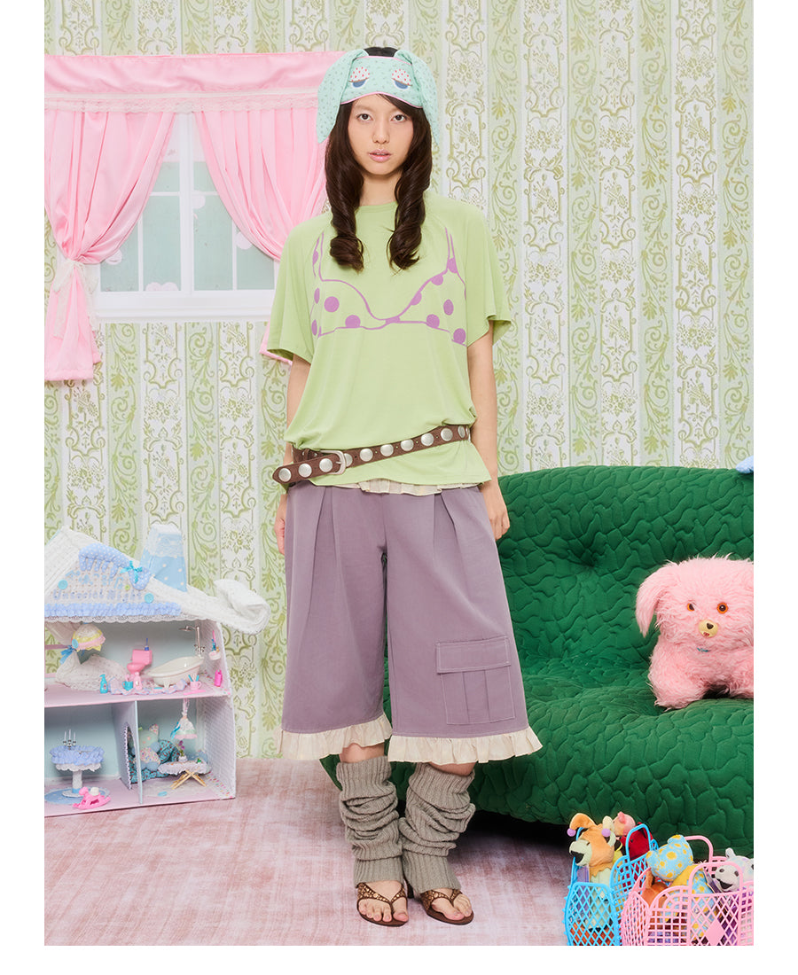 Front view of Unsocial Night's original oversized white T-shirt featuring a detailed trompe parody bikini graphic print