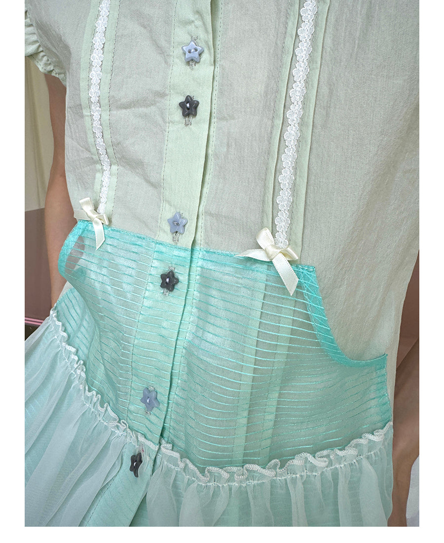 Unsocial Night short sleeve shirt showcasing the sheer mesh panel inserts, central button closures, slim-fit tailoring, and structural flutter sleeves