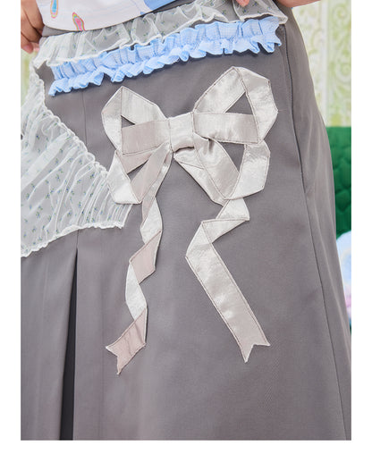 Front view of Unsocial Night grey coquette lace trim pleated skirt featuring a mid-rise A-line flare silhouette, a side zipper, and a fully lined design.