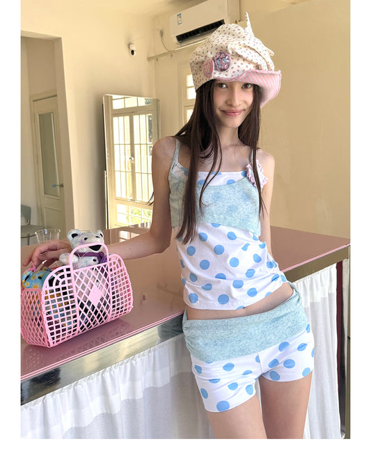 Unsocial Night knitted 2-piece set showcasing a whimsical polka dot print, contrast knit patchwork tailoring, camisole straps, and elasticated shorts
