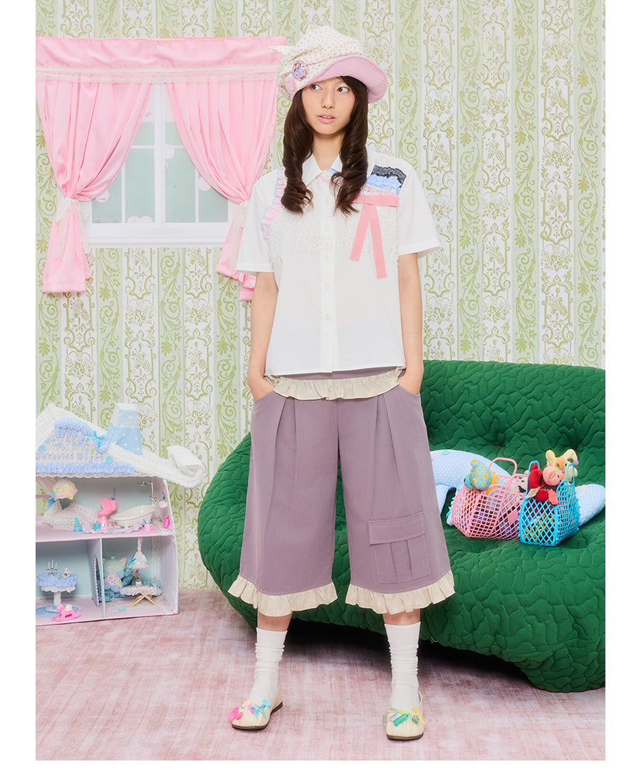 Front view of Unsocial Night purple star lace patchwork capri pants featuring a relaxed loose-fit silhouette, natural waist, and zipper fly closure in a cotton-linen fabric.
