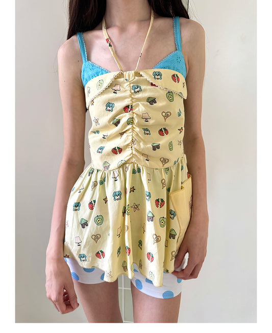 Unsocial Night strapless tube top showcasing a whimsical naive-art illustration print, central front detailing, and adjustable ribbon halter ties