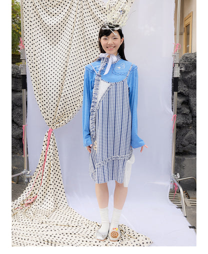 Front view of Unsocial Night checkered lace apron dress featuring a loose-fit suspender silhouette, sleeveless pullover design, and a coordinating checkered choker