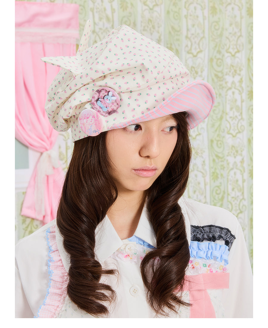 Front view of Unsocial Night strawberry striped cat ear beanie featuring a pleated slouched slouchy shape, a soft brim, and non-adjustable cotton knit texture.