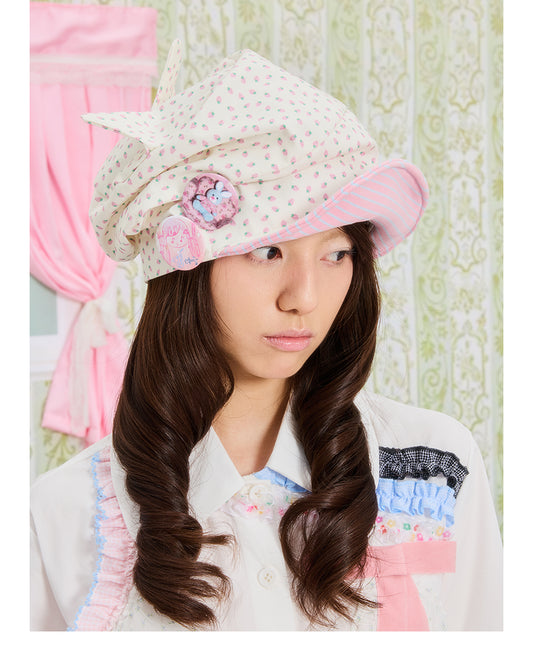 Front view of Unsocial Night strawberry striped cat ear beanie featuring a pleated slouched slouchy shape, a soft brim, and non-adjustable cotton knit texture.