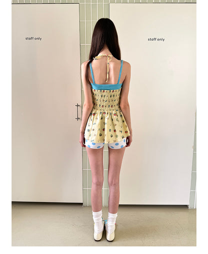 Unsocial Night strapless tube top showcasing a whimsical naive-art illustration print, central front detailing, and adjustable ribbon halter ties