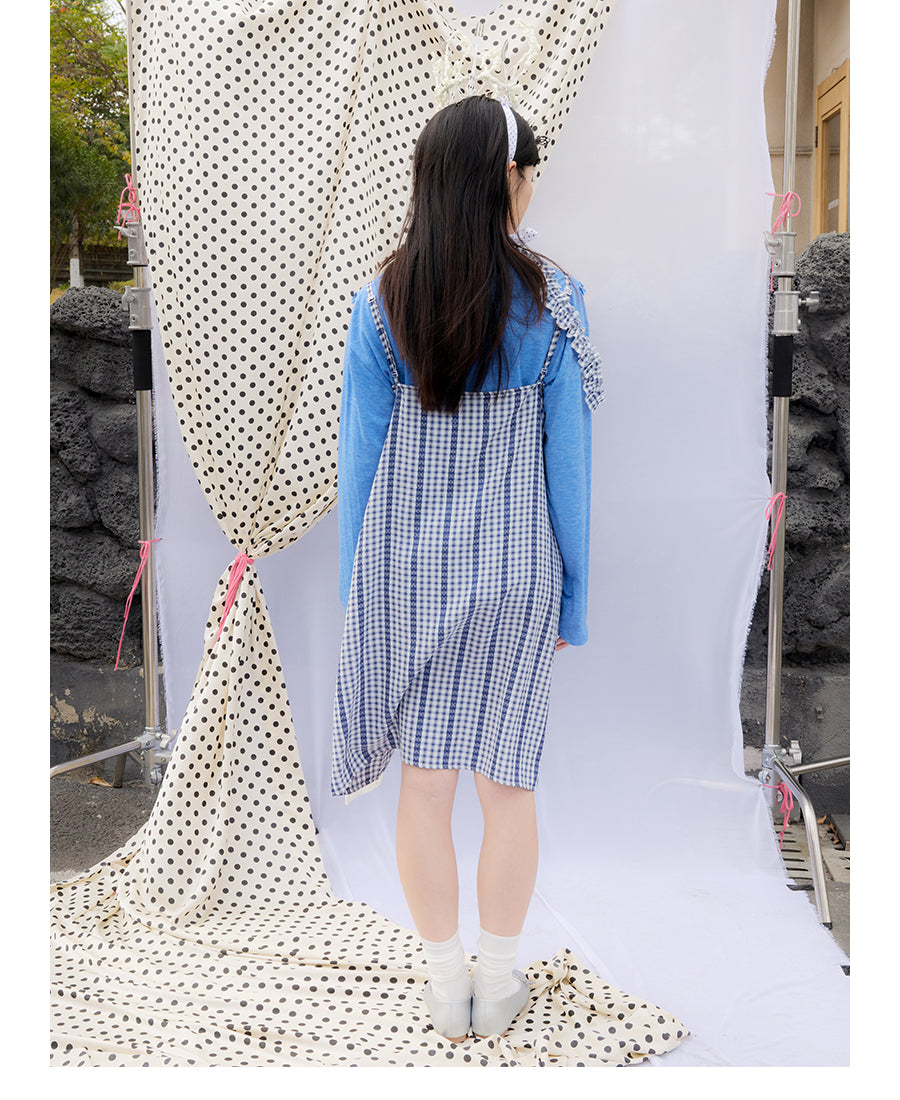 Front view of Unsocial Night checkered lace apron dress featuring a loose-fit suspender silhouette, sleeveless pullover design, and a coordinating checkered choker